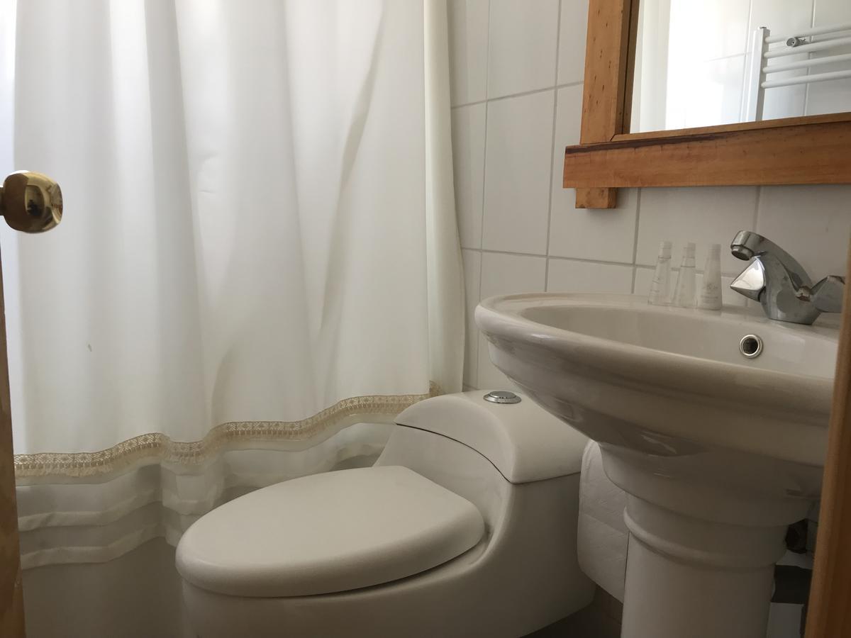Hostal Los Pioneros Puerto Natales Esterno foto